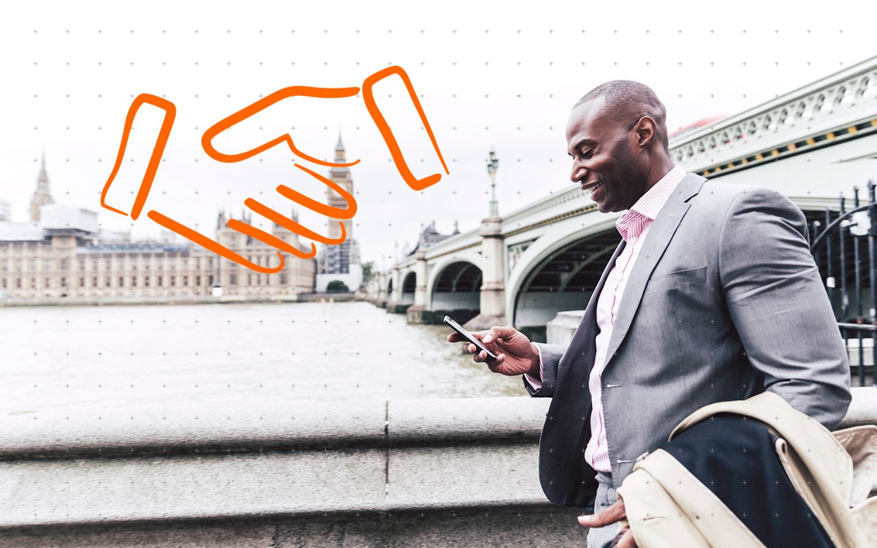 businessman walking by a river with a handshake gesture on the image