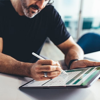 Man using tablet computer