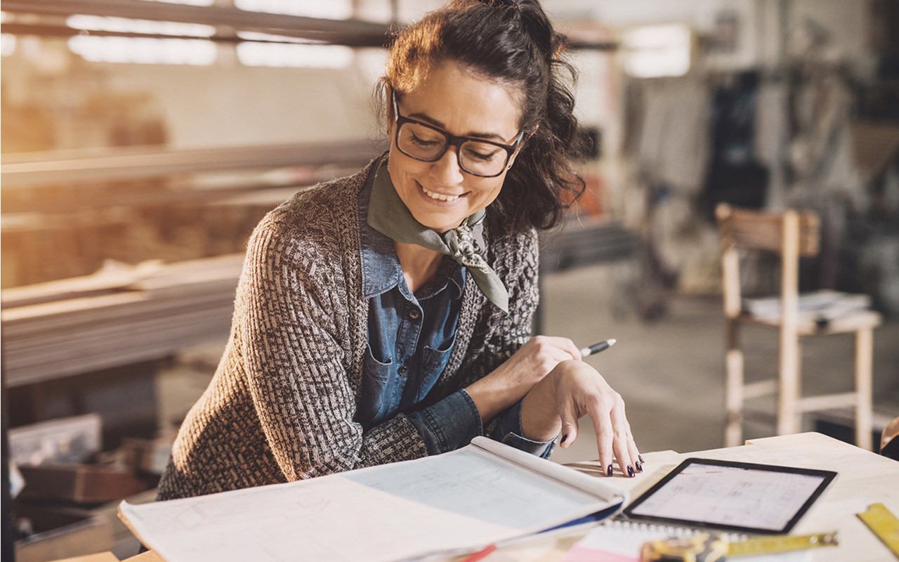woman working & smiling