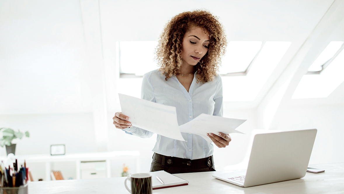woman looking at documents