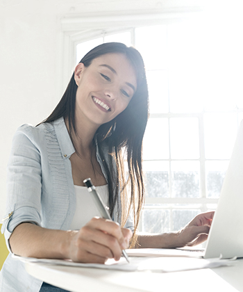 writing in a notebook