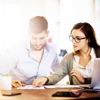 two colleagues working together