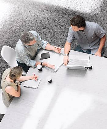view from above of colleagues in a meeting