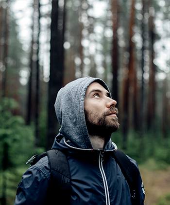 Driving efficiency through sustainability man looking up